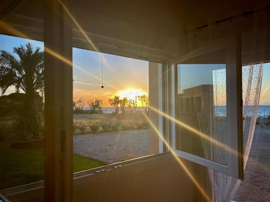 Lambou Beach Sunset Soroni Exterior photo